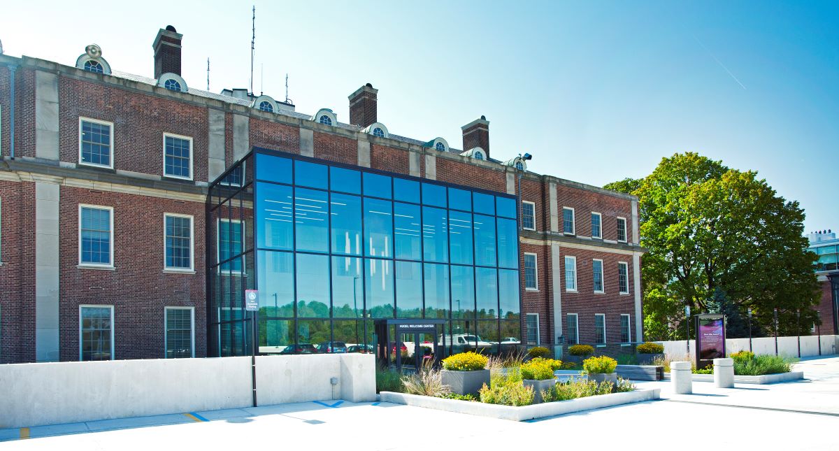 glass entrance on older brick building